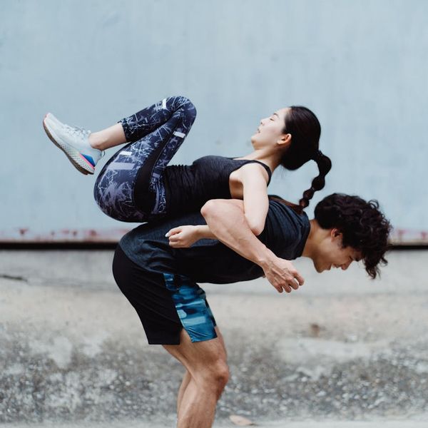 Man stretching outdoors feeling balanced and energetic.